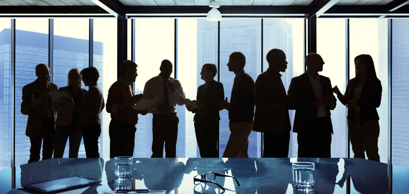 Group of Business Talking in a Meeting