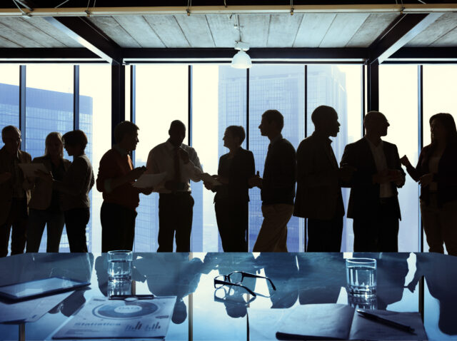 Group of Business Talking in a Meeting